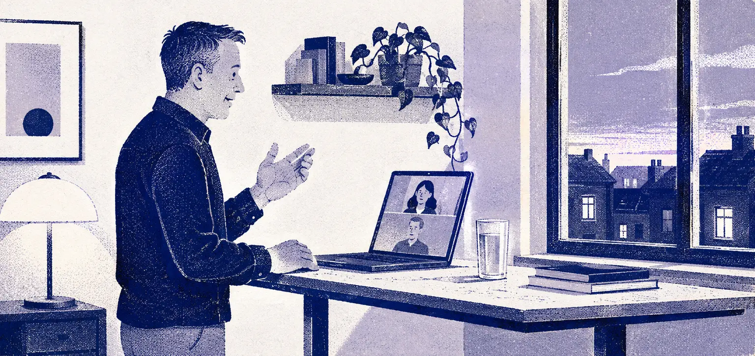 Illustration of a coach on a video call at a standing desk in the evening, mid-explanation, with a lamp on and rooftops at dusk outside